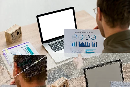 man-working-with-infographics-indoors